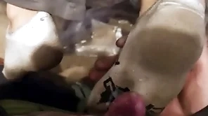 Two young guys exploitative socks footjob